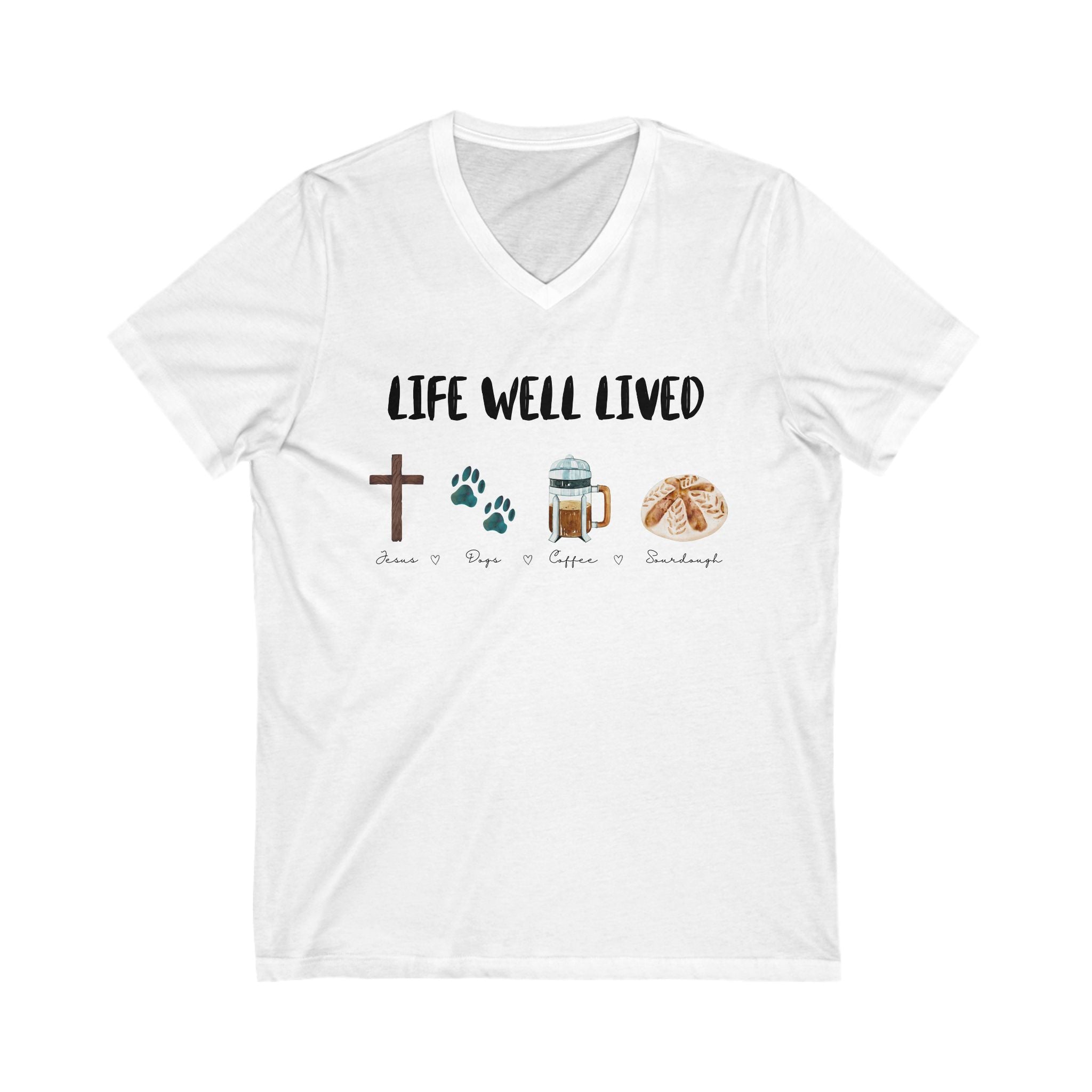 A white V-neck t-shirt with the text 'LIFE WELL LIVED' and icons of a cross, a paw print, a coffee cup, and a slice of sourdough bread.